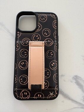Black Phone Case with Smiley Face Pattern and Strap Stand